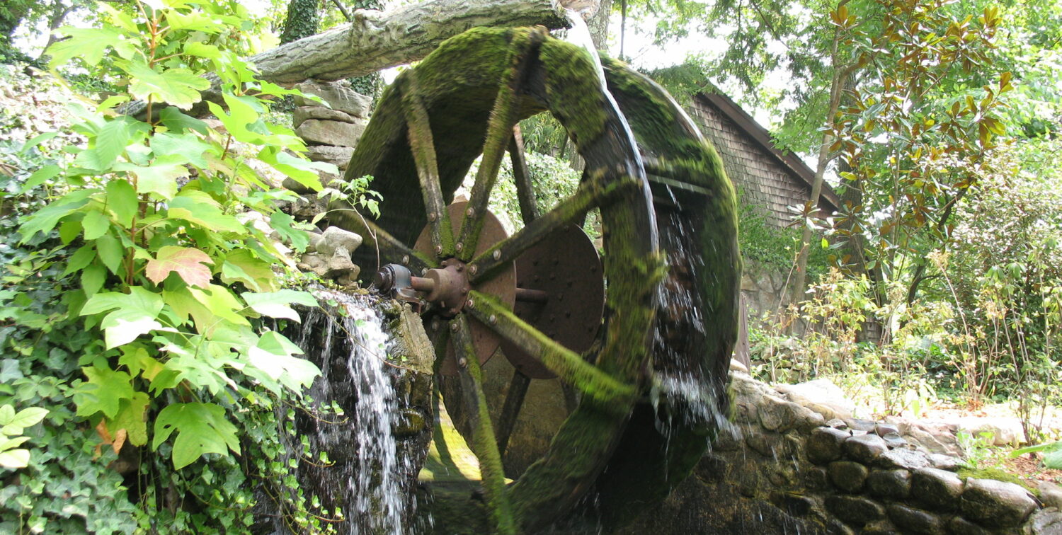 Photo of mossy waterwheel