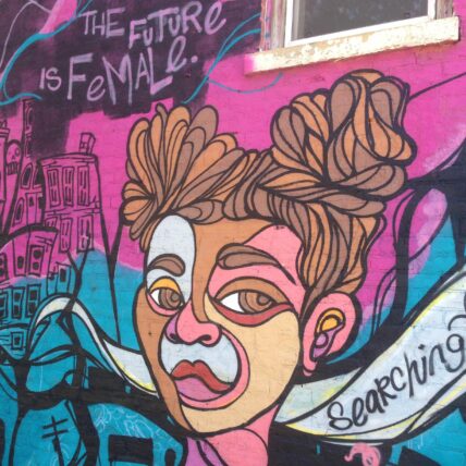 Photo of mural that reads "the future is female"